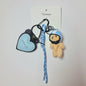 Llavero y Charm Osito con casco celeste