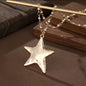 Collar dorado con colgante de Estrella